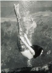 Barbara Wynn's performing as a mermaid.