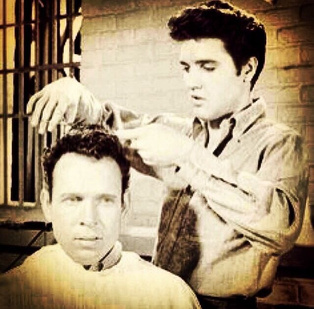 Elvis giving a trim in a movie